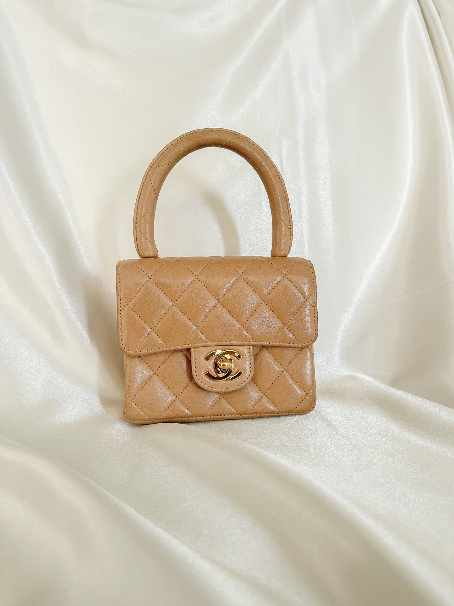 1990s Chanel Lambskin Quilted Mini Top Handle Bag