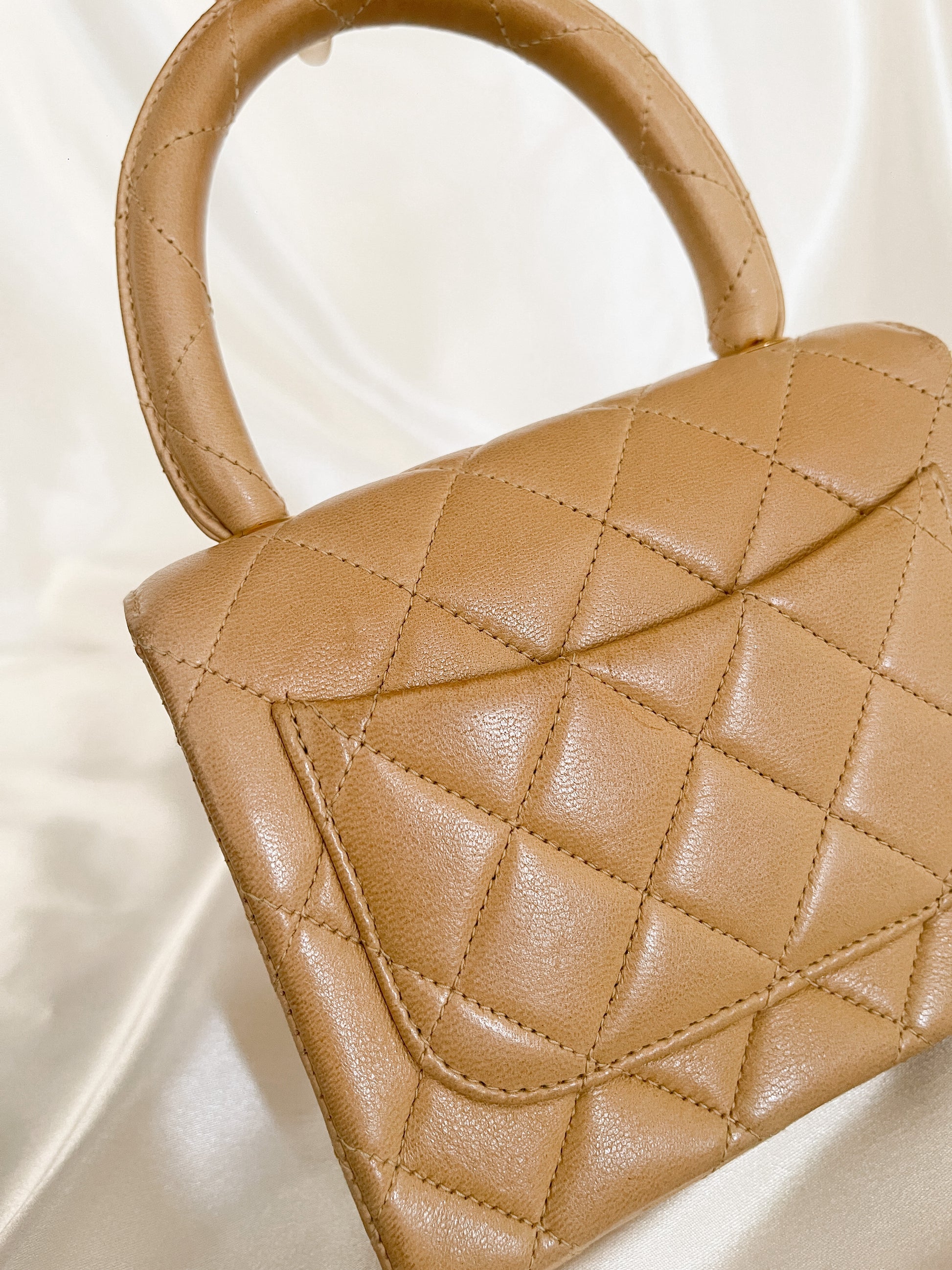 Vintage CHANEL CC Logo Turnlock MICRO Mini Brown Quilted -  Denmark