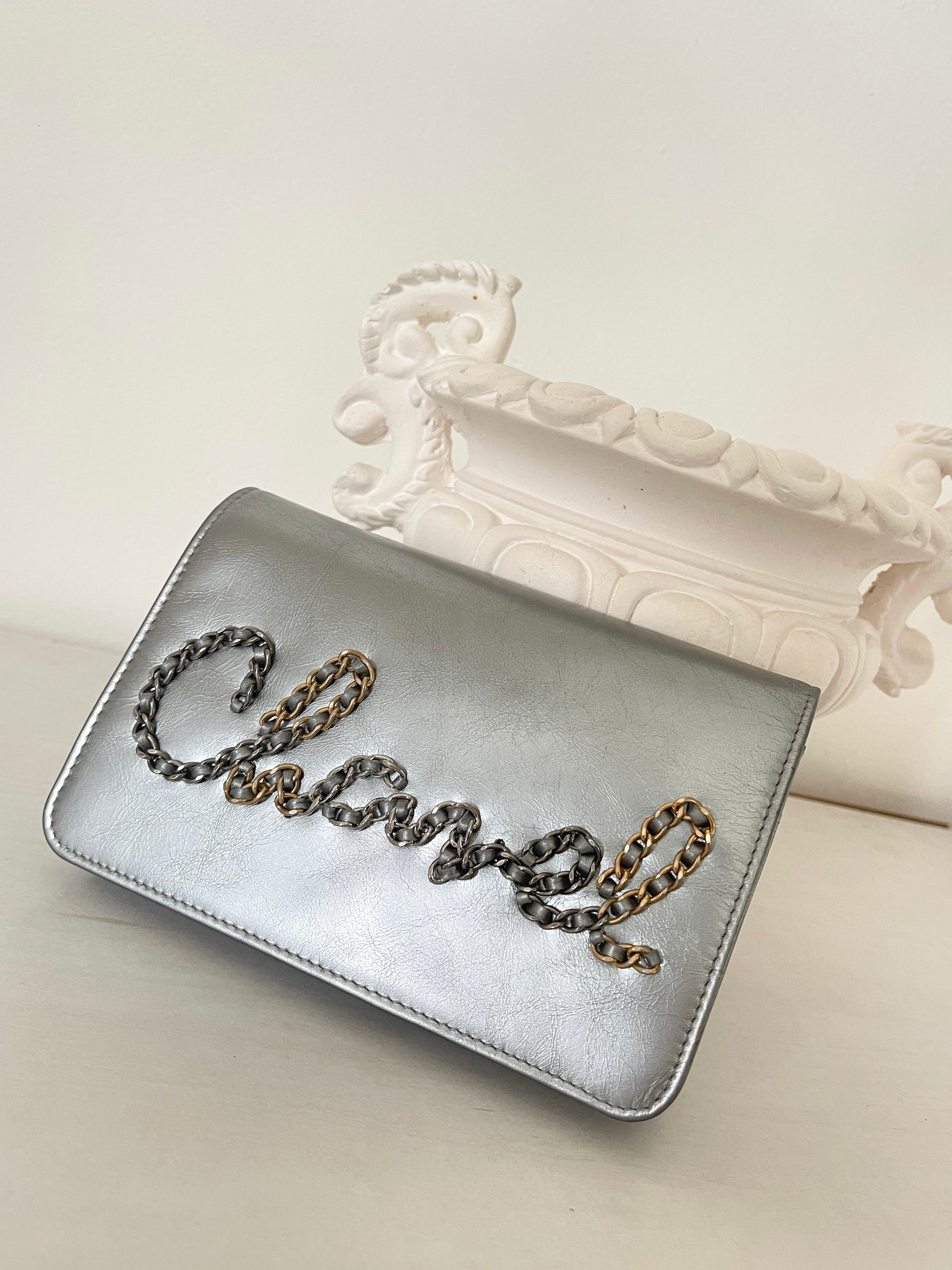chanel silver clutch bag